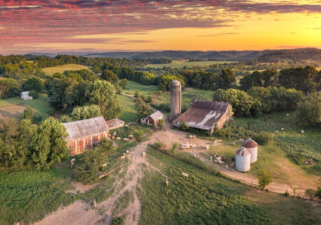 Farm with silo and barns at sunset — Shelby County, TN mortgage and home loan guide from Valor Mortgage